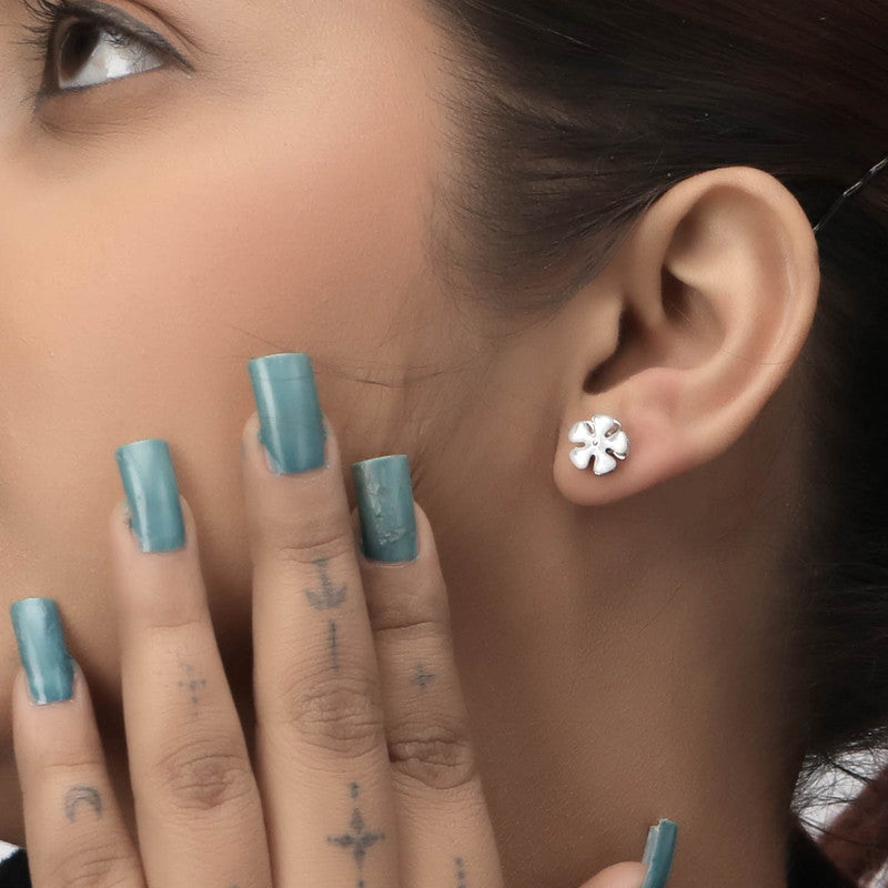 Girl wearing 925 Silver Spinning Flower Earrings – perfect Raksha Bandhan and festive gift for sisters and loved ones.
