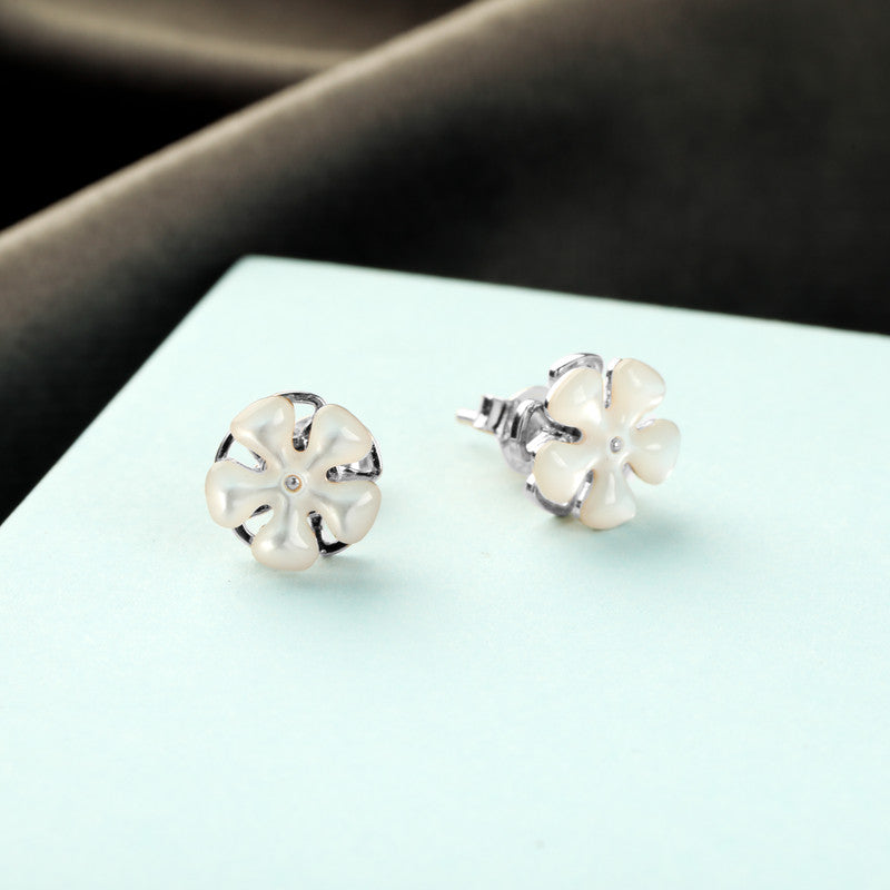 Sterling silver spinning flower earrings – trendy festive jewelry for Diwali, Bhai Dooj, and Karwa Chauth gifting.