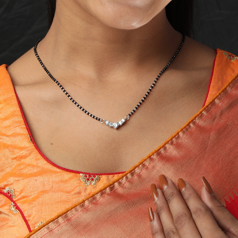 Woman wearing 925 Silver Sweetheart Mangalsutra – modern heart design mangalsutra in silver for stylish everyday look