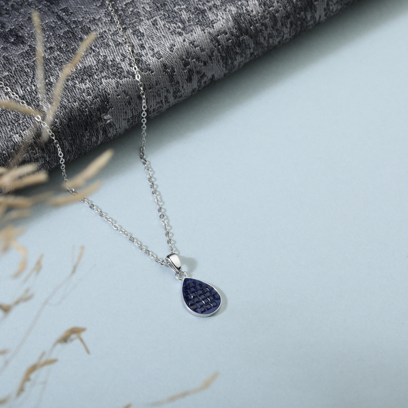 925 Silver Teardrop Pendant displayed as prop image on festive background – stylish silver pendant with fine detailing.