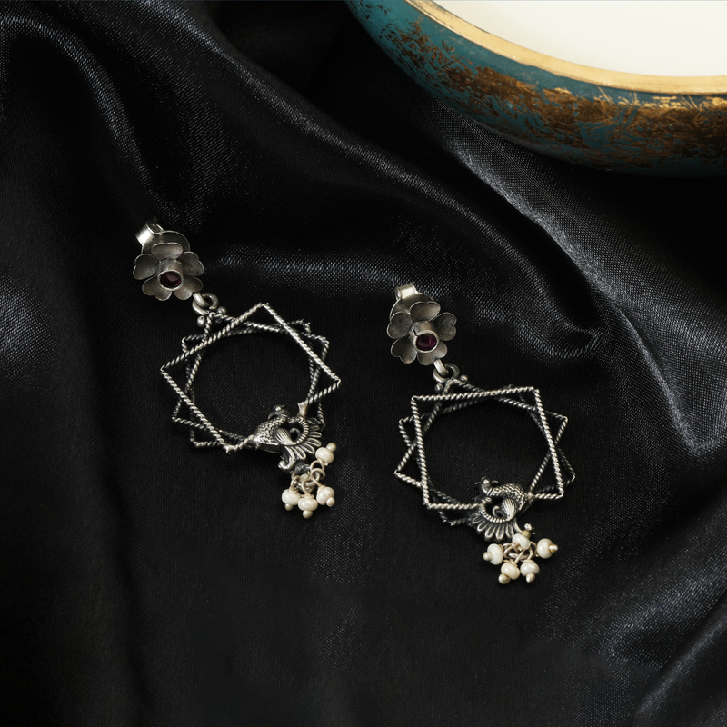 925 Silver Trigo Tribal Earrings displayed as prop image on festive background – traditional silver earrings with fine detailing.