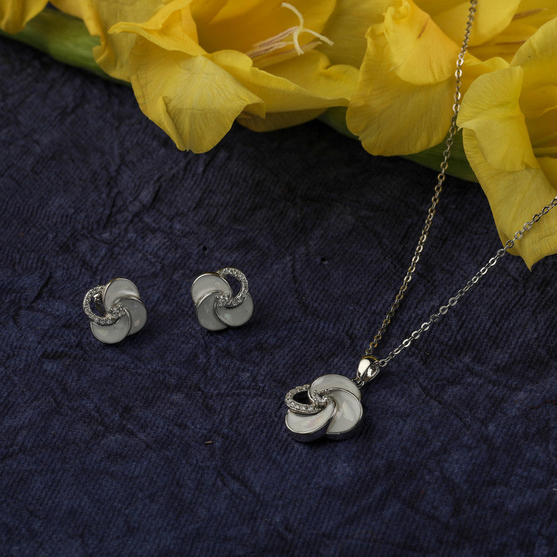 925 silver windmill pendant set displayed with props – unique silver accessory