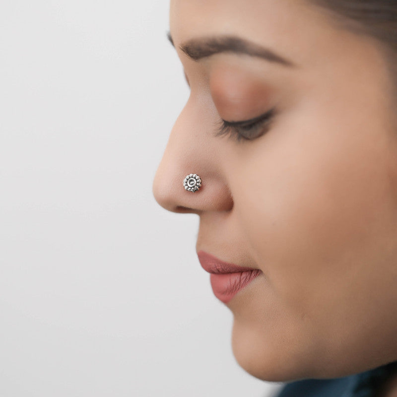 Woman wearing 925 Sterling Silver Circle Nose Stud styled on nose