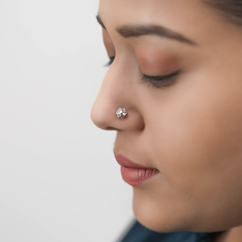 Woman wearing 925 sterling silver flower nose stud – stylish ethnic nose jewelry