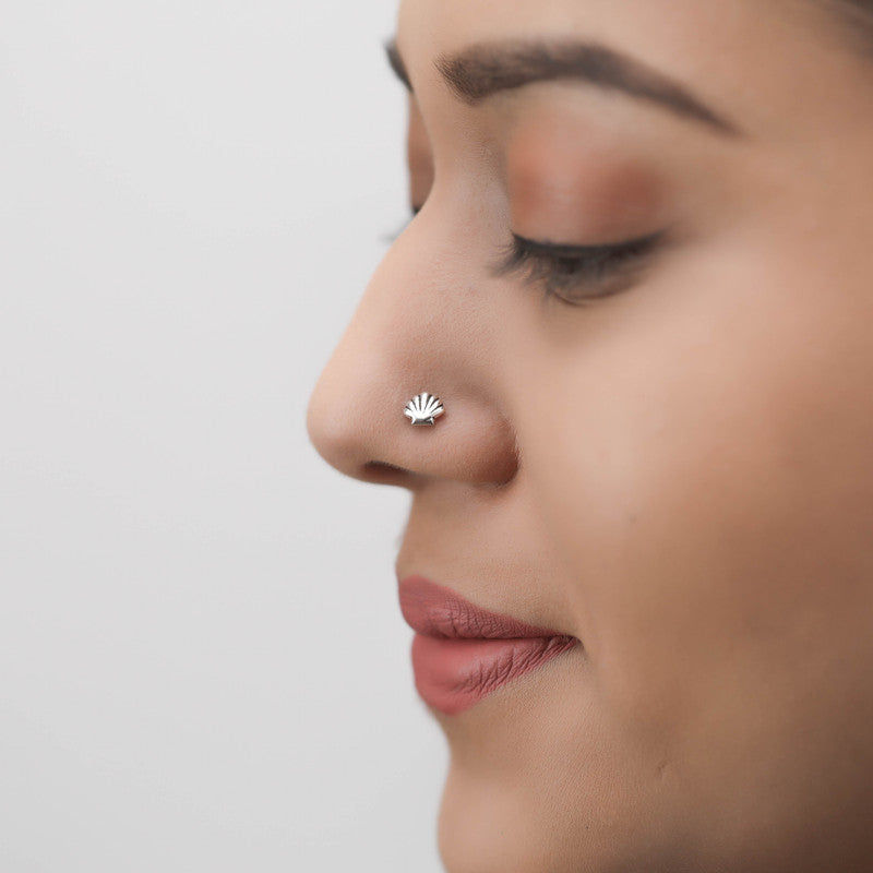 Woman wearing 925 Sterling Silver Seashell Nose Pin styled on nose
