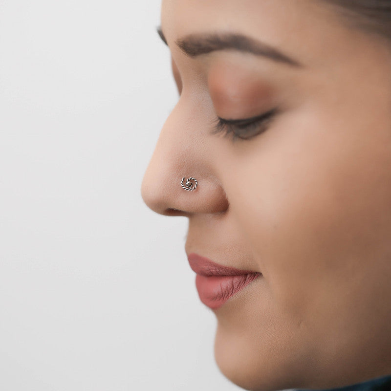 Woman wearing 925 Sterling Silver Spiral Nose Pin styled on nose