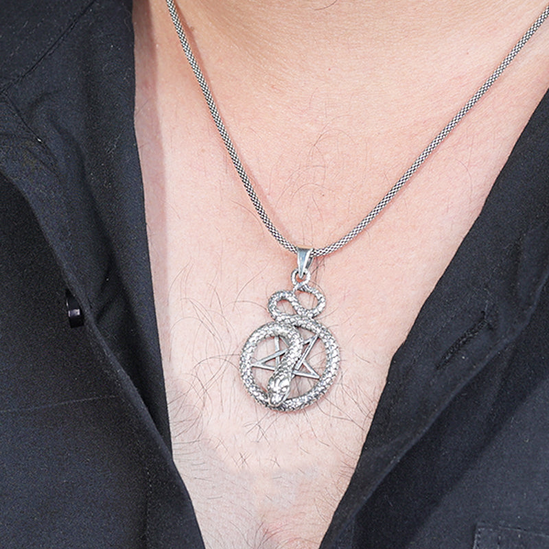 Man wearing 925 Silver Star and Snake Pendant Necklace with Stylish Symbolic Design