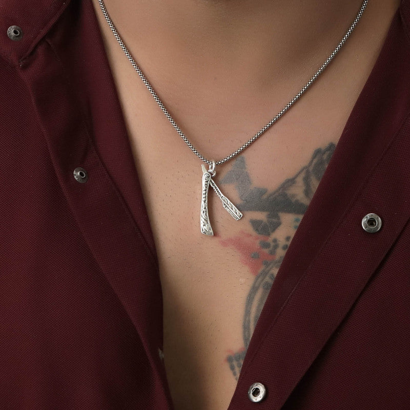 Man wearing 925 Silver Tattoo Pendant Necklace with Stylish Masculine Design