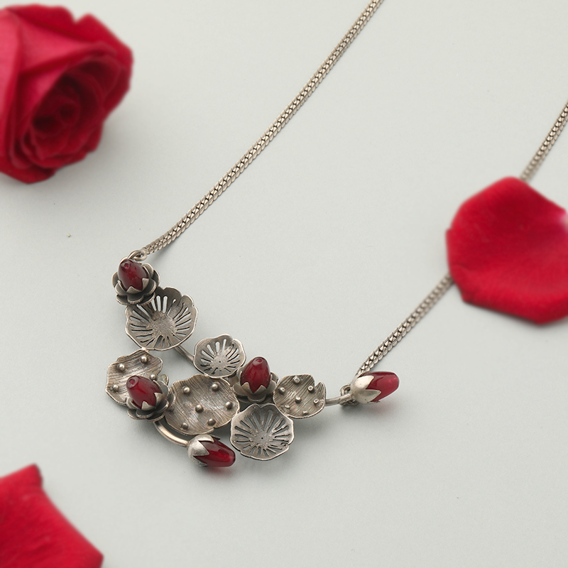 925 silver lotus bud pendant on wooden background, ideal for Diwali and wedding celebrations