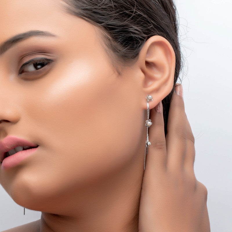Trendy 925 silver floral thread earrings on model – perfect festive jewellery for Karva Chauth, Raksha Bandhan, and parties.