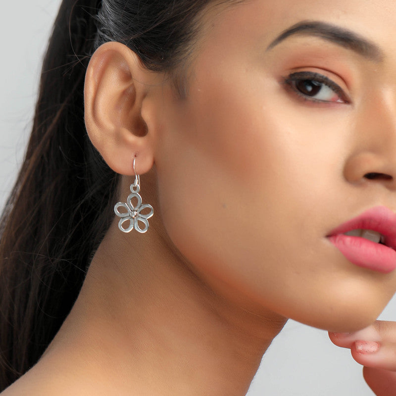 Trendy 925 silver flower charm dangle earrings on model – perfect festive jewellery for Karva Chauth, Raksha Bandhan, and parties