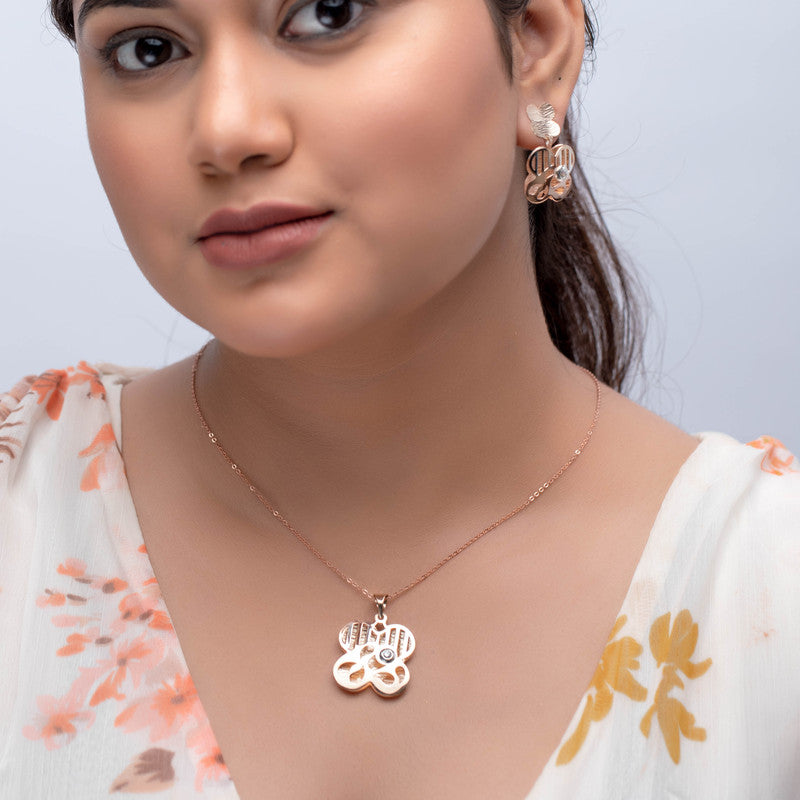 Woman wearing silver flower of life pendant, elegant accessory for festivals and special occasions.