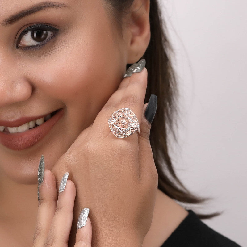 Woman styled with silver rose gold spinner ring, chic accessory for Navratri wear and festive occasions.