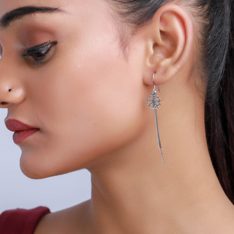 Trendy 925 silver long chain floral earrings on model – perfect festive jewellery for Karva Chauth, Raksha Bandhan, and parties.