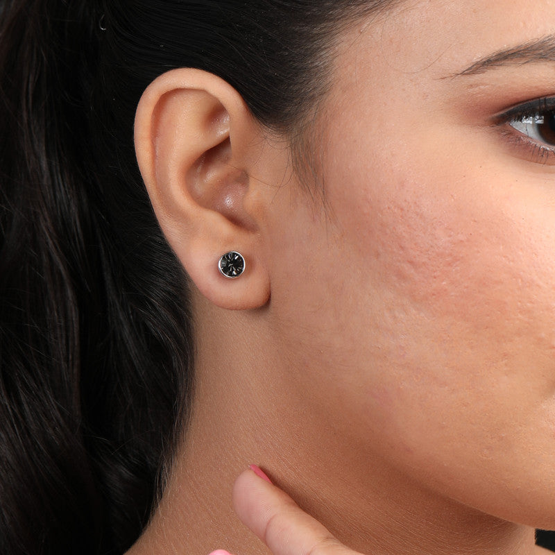 Trendy black zirconia earring tops on model – perfect festive jewellery for Karva Chauth, Raksha Bandhan, and parties.