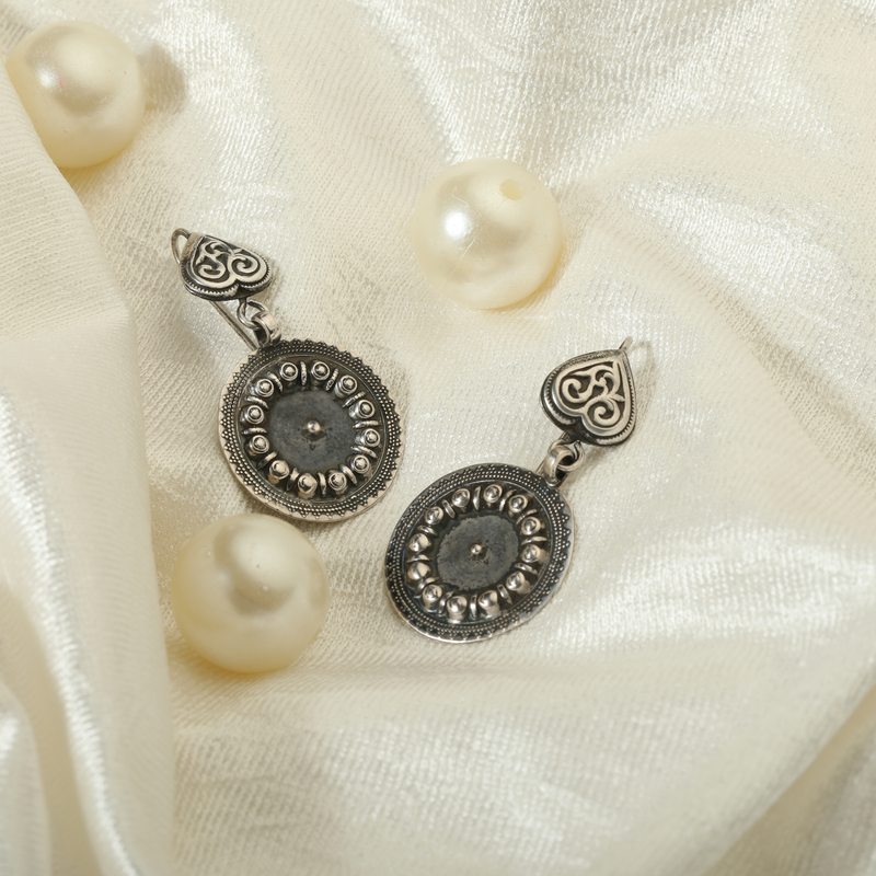 Elegant 925 Oxidized Silver Earrings displayed as prop image on festive background – traditional oxidized silver earrings with fine detailing.