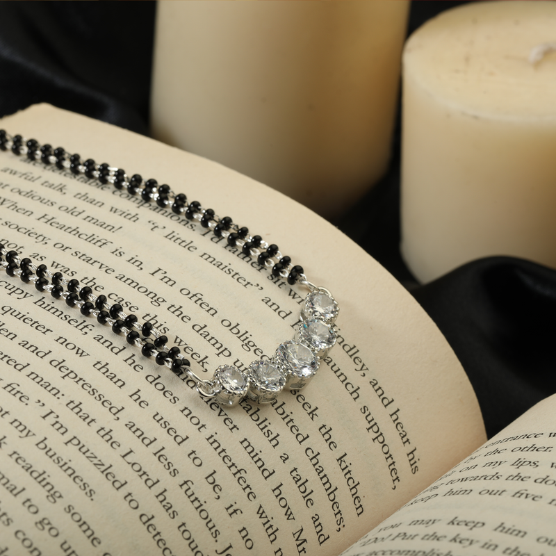 925 Silver Eternal Bond Mangalsutra displayed on festive background – traditional silver jewellery with graceful design.