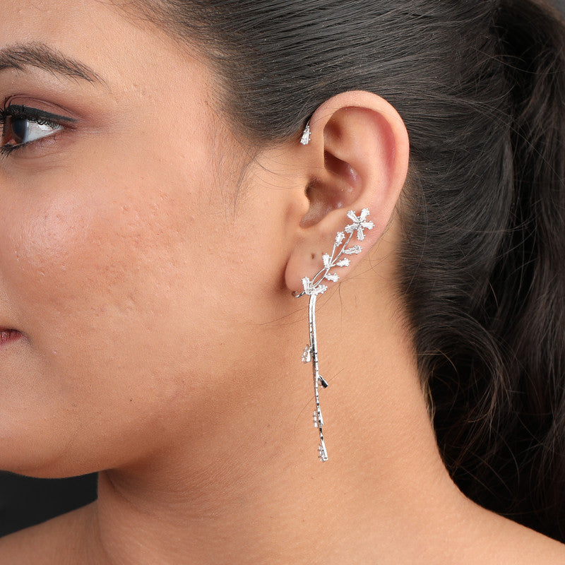 Trendy floral ear cuff with tassel on model – perfect festive jewellery for Karva Chauth, Raksha Bandhan, and parties.
