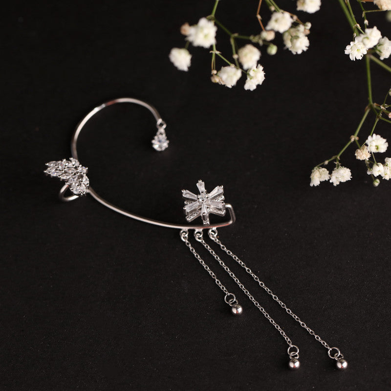 Flower ear cuff with tassel – stylish festive gift for Christmas, New Year, and wedding season.