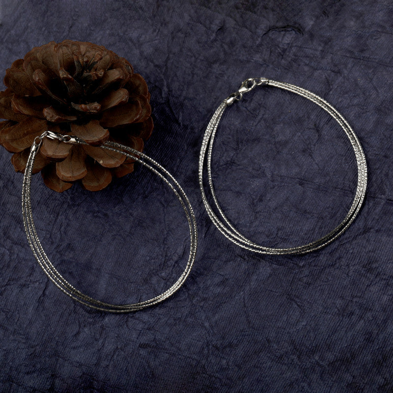 Gleaming layered 925 silver anklet, radiant accessory for Karwa Chauth and Diwali wear.