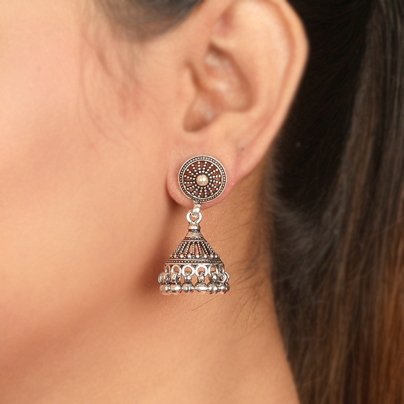 Stylish oxidised silver jhumka earrings on model – elegant ethnic accessory for Navratri, Durga Puja, and festive outfits
