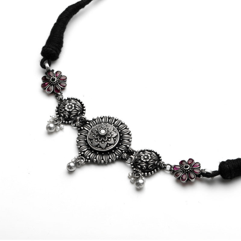 Oxidised silver multi flower choker necklace close-up, Indian festive jewelry, ethnic statement necklace, floral design, traditional celebration accessory