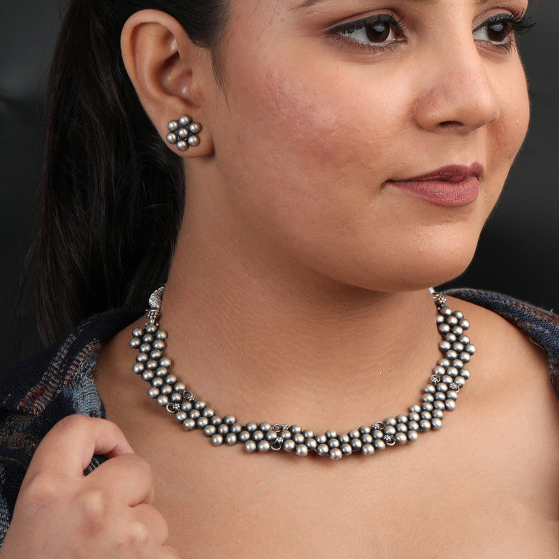 Model wearing Oxidized Silver Ball Flower Necklace – stylish Navratri and wedding festive jewellery