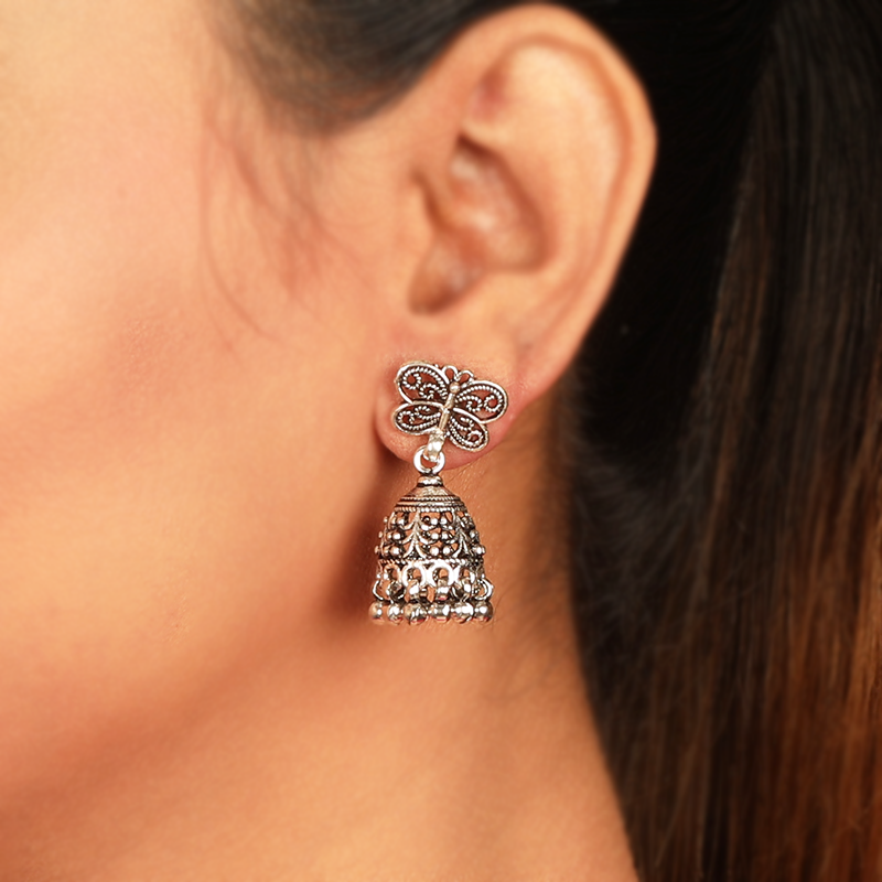 Oxidized Silver Butterfly Jhumka Earrings on Model – Elegant Ethnic Silver Jewellery for Navratri, Diwali and Wedding Celebrations
