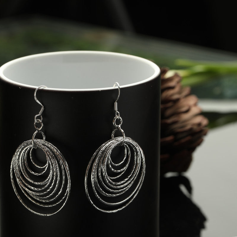 Designer Oxidized Silver Circle Earrings with Ethnic Backdrop – Traditional Silver Jewellery for Festive Celebrations