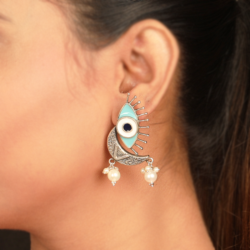 Oxidized Silver Evil Eye Earrings on Model – Trendy Protective Silver Earrings for Festivals, Parties and Ethnic Outfits

