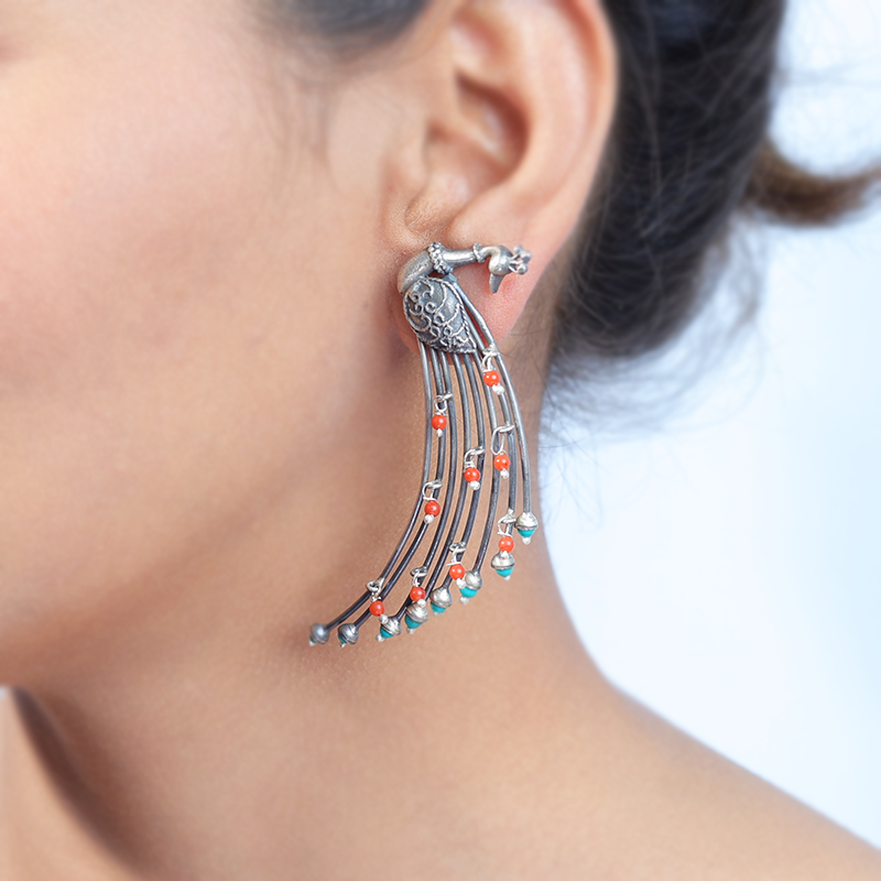 Oxidized Silver Peacock Feather Earrings on Model – Traditional Festive Silver Earrings for Sarees, Lehengas and Ethnic Wear
