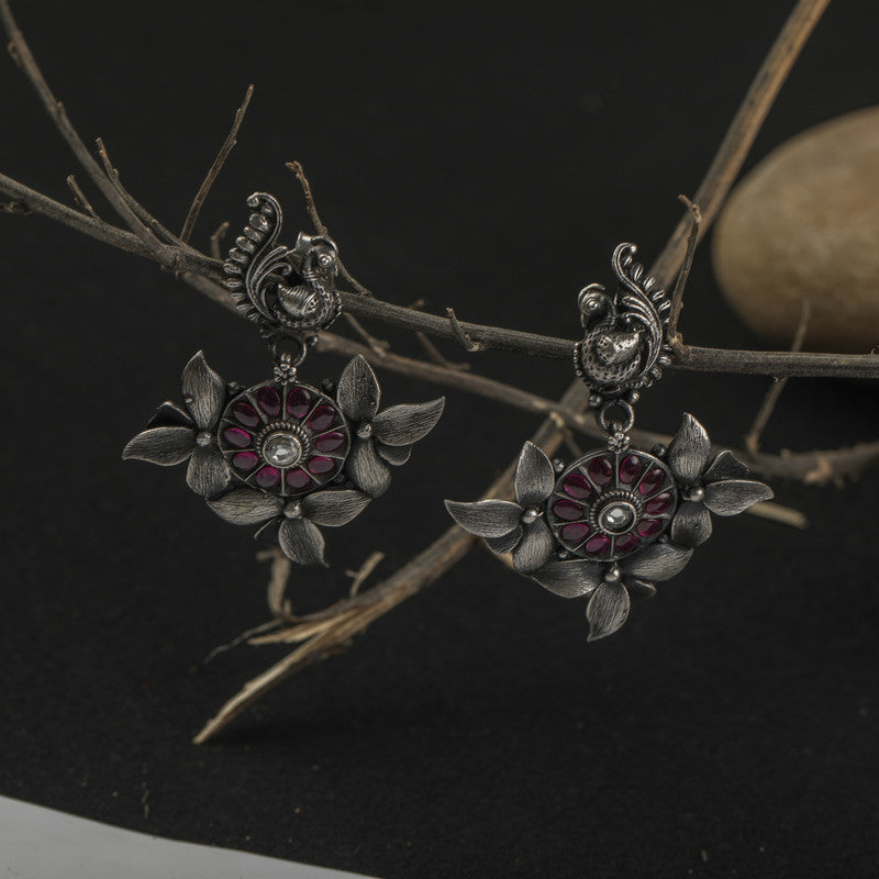 Designer Oxidized Silver Peacock Tassel Earrings with Ethnic Backdrop – Stylish Silver Jewellery for Festive Celebrations