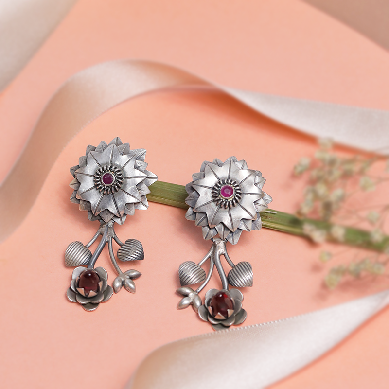 Designer Oxidized Silver Prim Rose Earrings with Ethnic Backdrop – Stylish Silver Jewellery for Festivals, Weddings and Celebrations

