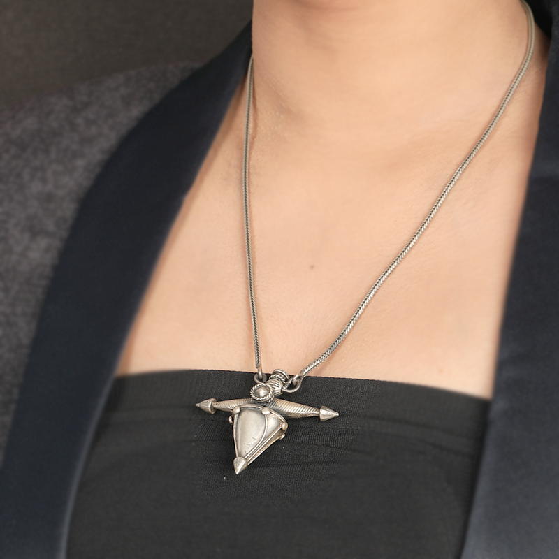 Criss cross oxidised silver necklace styled for Navratri, Diwali, and wedding occasions