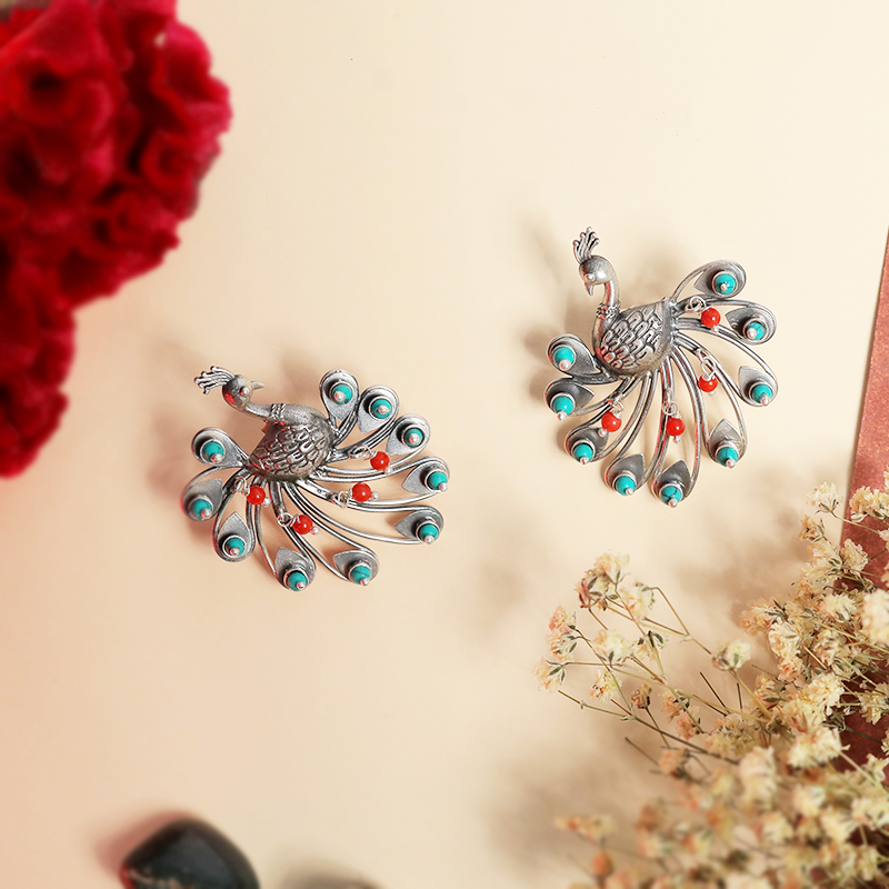 Oxidized silver dancing peacock design earrings – stylish traditional accessory for sarees, lehengas, and festive wear