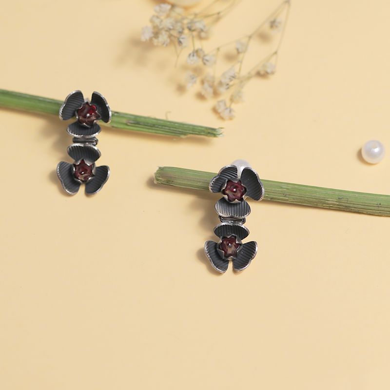 Oxidized silver double flower design earrings – fashionable festive accessory for sarees, lehengas, and ethnic outfits