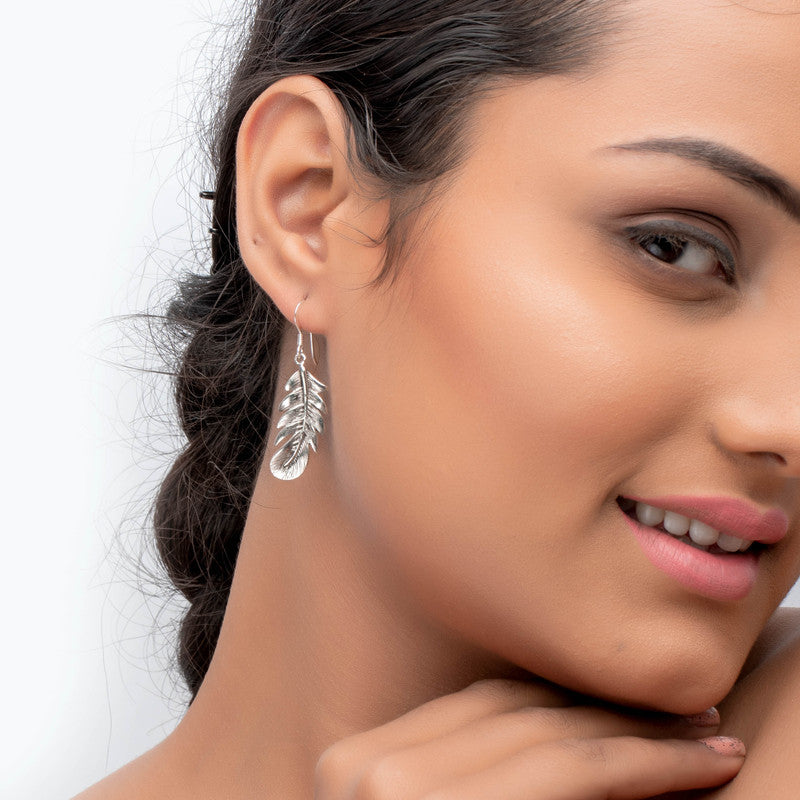 Oxidized silver feather earrings on model – stylish ethnic accessory for weddings, Karwa Chauth, and festive celebrations