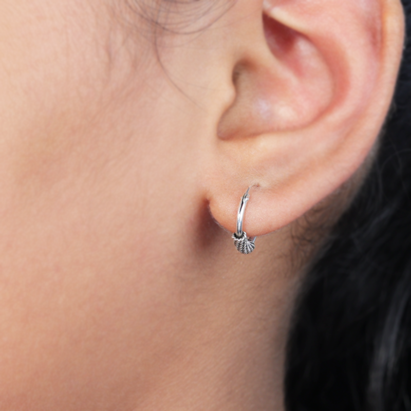 Elegant oxidized silver spring bali earrings on model – stylish ethnic hoops for weddings and cultural celebrations