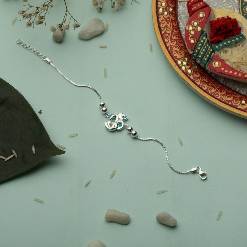 Silver rakhi for kids with Kartik Om bracelet – original silver rakhi design for Raksha Bandhan tradition
