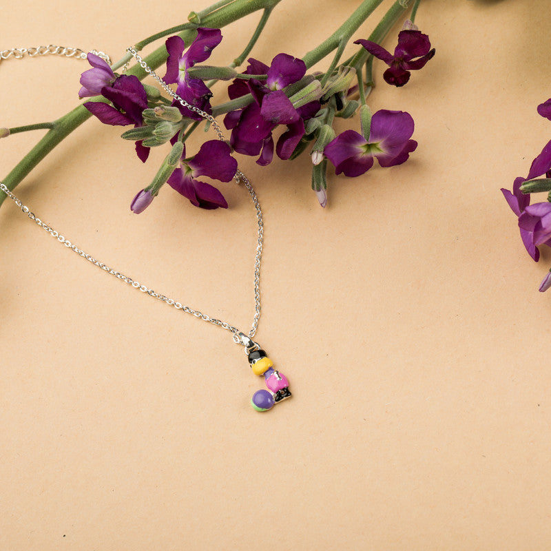 Queen Pendant Necklace for Kids in 925 Silver styled on playful background