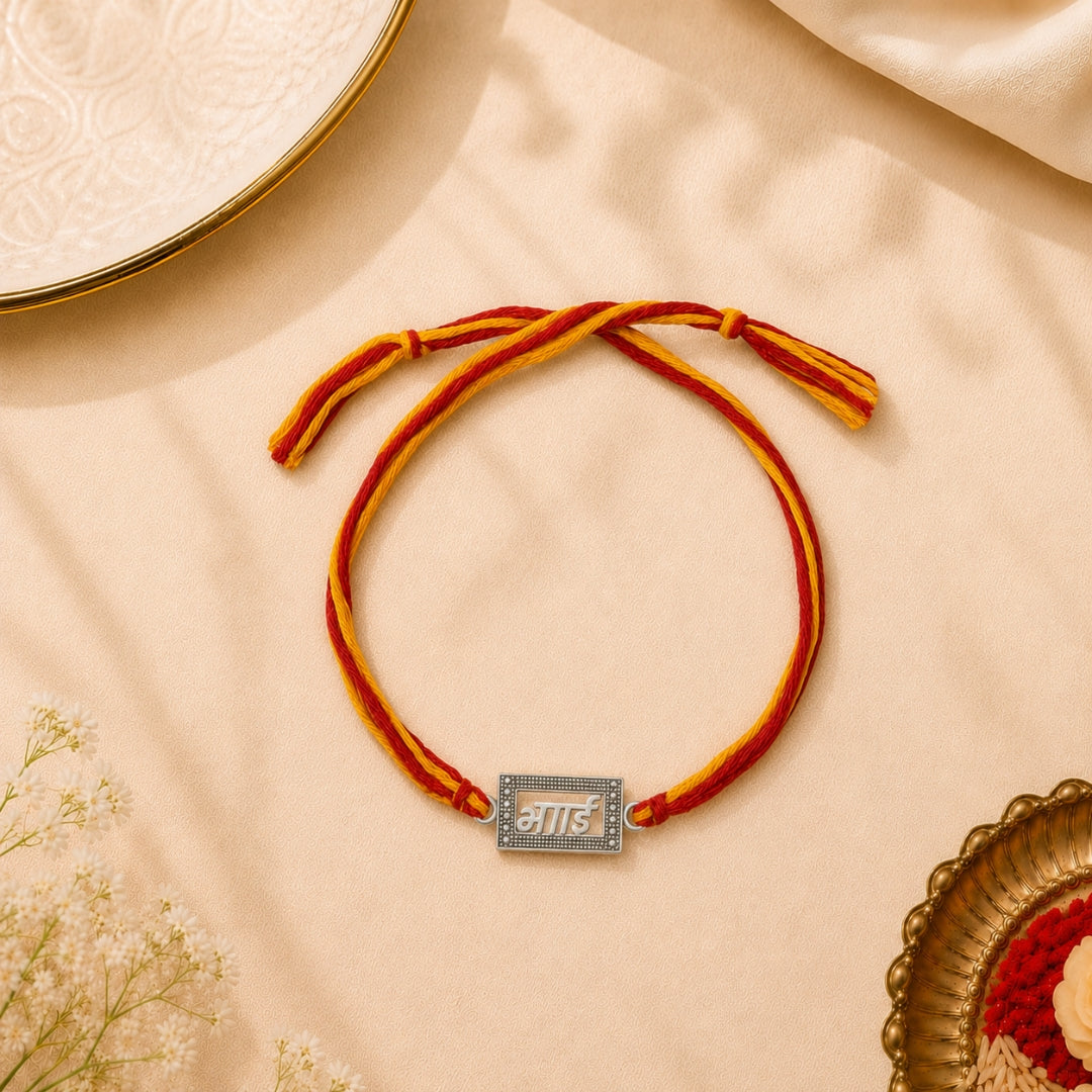 Silver Bhai Rakhi placed with roli chawal and festive decor – premium 925 silver Raksha Bandhan gift by Silviya.