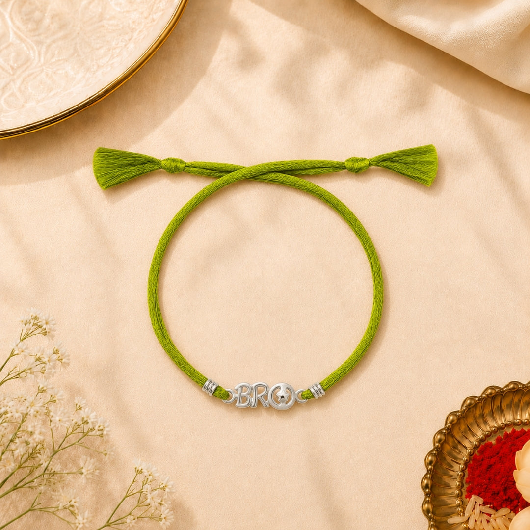 Silver Bro Letter Rakhi placed with roli chawal and festive decor – premium 925 silver Raksha Bandhan gift by Silviya.