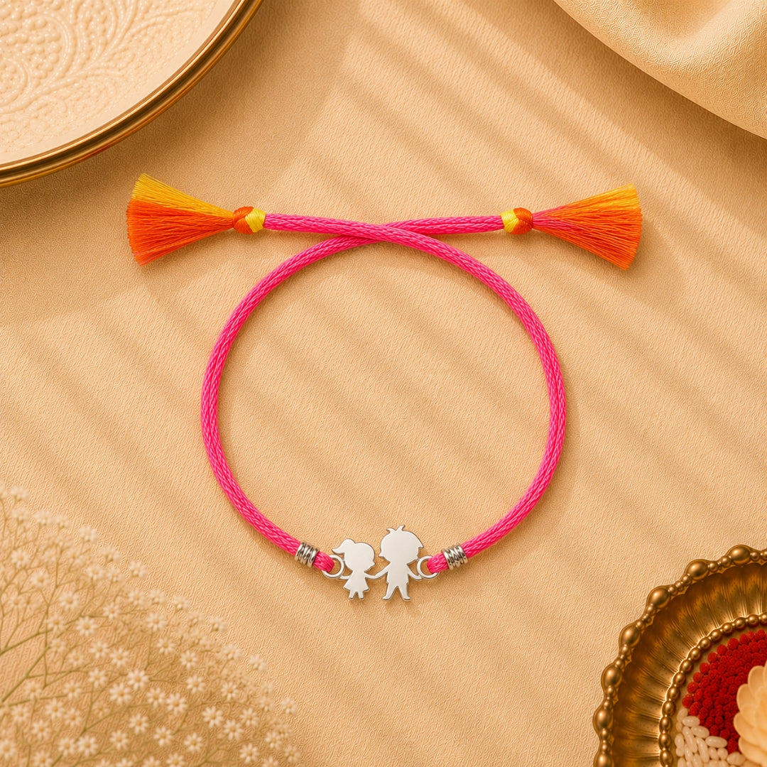 Silver Brother-Sister Duo Rakhi placed with roli chawal and festive decor – a premium 925 silver Raksha Bandhan gift by Silviya.