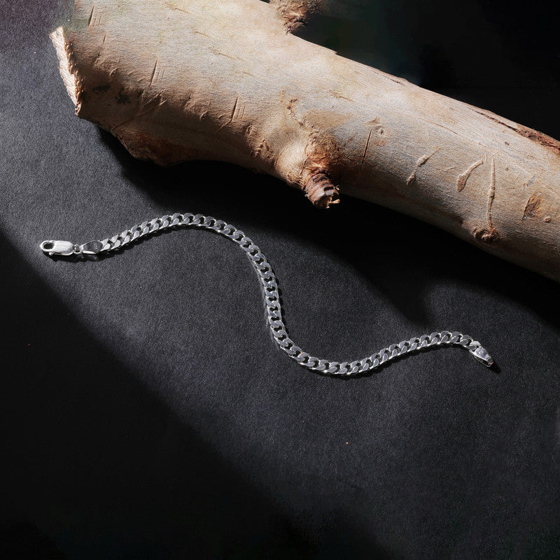 Close-up of Silver Curb 8 Vintage Designer Bracelet on white background