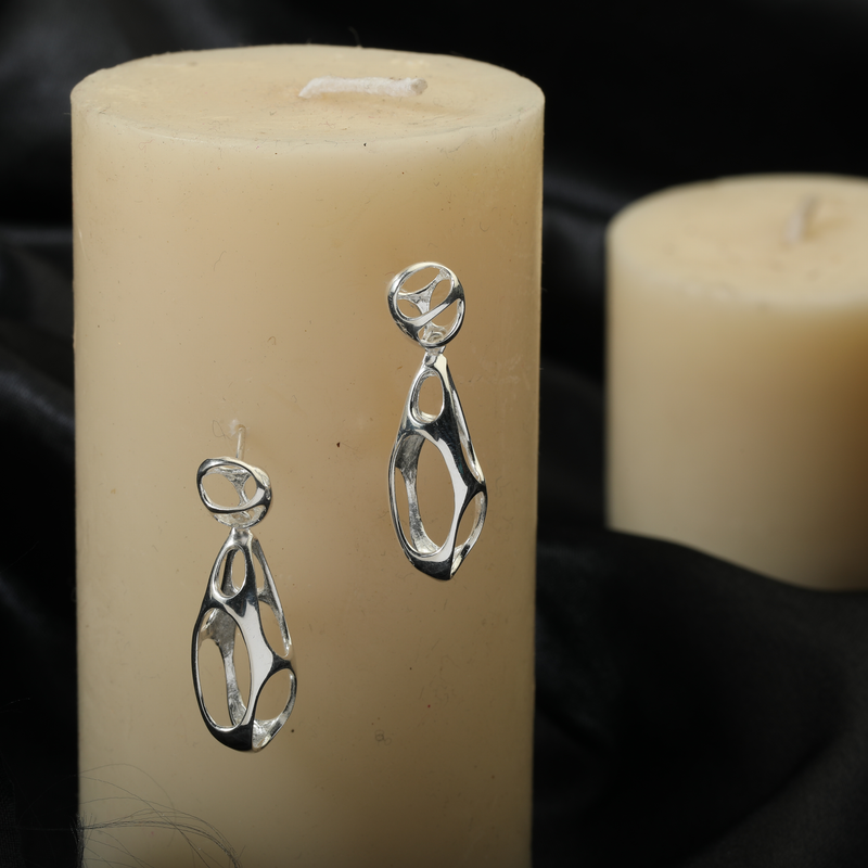 925 Silver Fancy Falls Earrings displayed as prop image on festive background – stylish silver earrings with fine detailing.