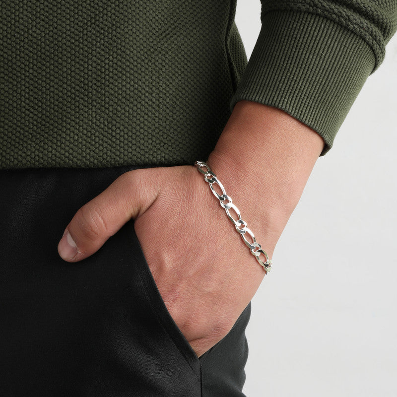 Silver Figaro Bracelet prop display highlighting solid chain details