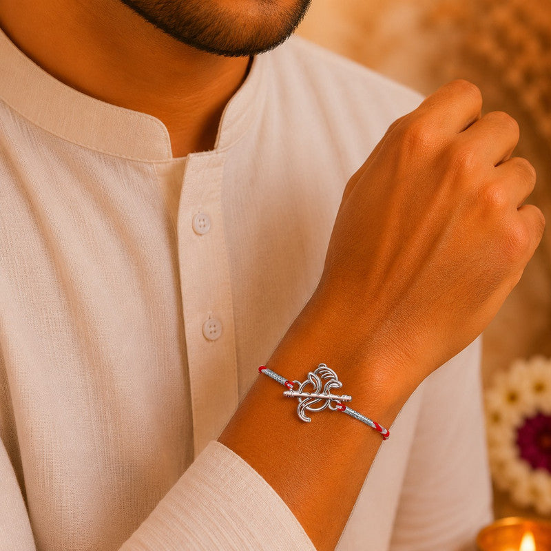 Brother wearing Silver Lord Ganesh Ji Rakhi made with 925 Sterling Silver