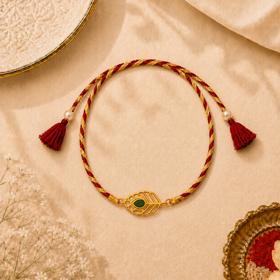 Pure Silver Mor Pankh Rakhi placed with roli and chawal – elegant festive Raksha Bandhan presentation by Silviya