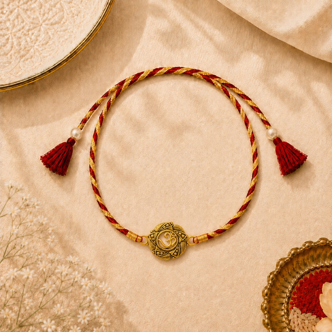 Silver Om with Leaf Rakhi placed with roli chawal and festive decor – premium 925 silver Raksha Bandhan gift by Silviya.