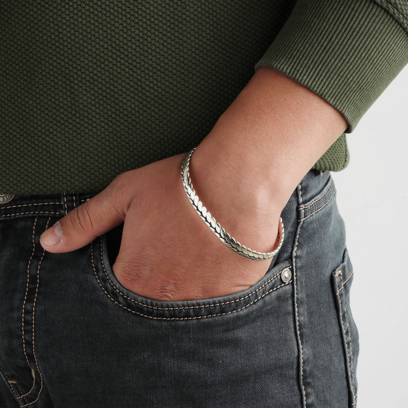 Model wearing Silver Open Cuff Braided Woven Band – bold and stylish cuff look